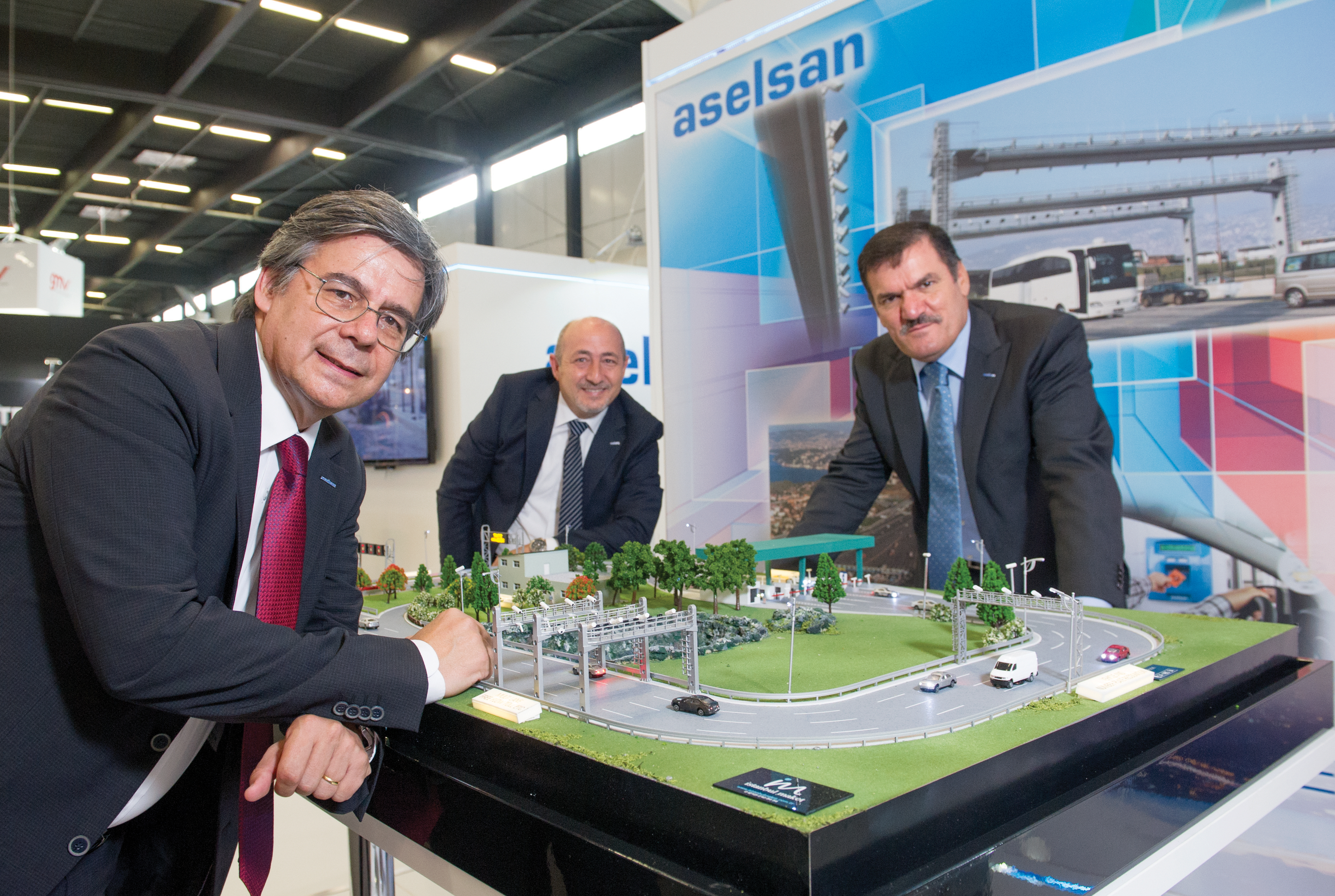 Suat Bengur (left), Erkan Dorken (centre) and Ziya Akbas ITS WC 15 Day 2 p12 Aselsan Innovations