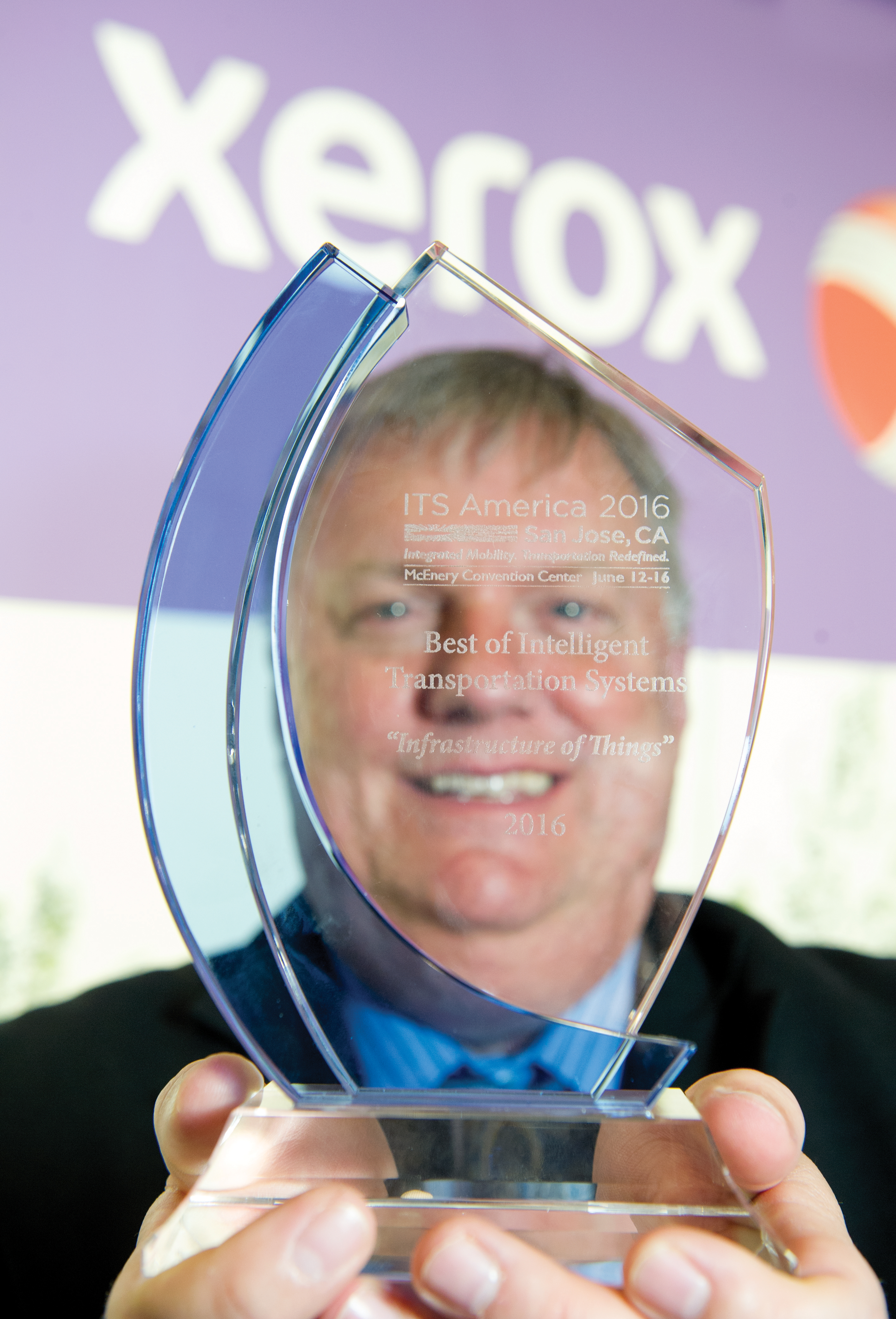 Joesph Averkamp with the Best of ITS Award Xerox Best of ITS Award