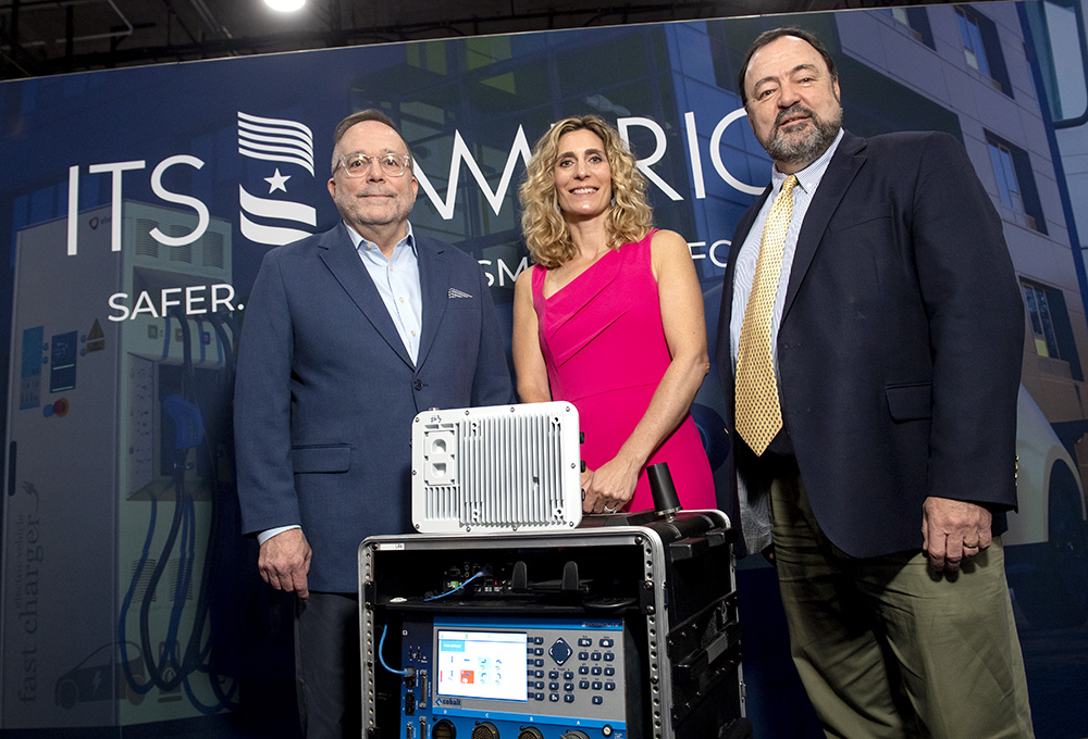 Brad Stertz (left) of Audi Government Affairs with ITS America’s Laura Chace and Blaine Leonard from Utah DOT