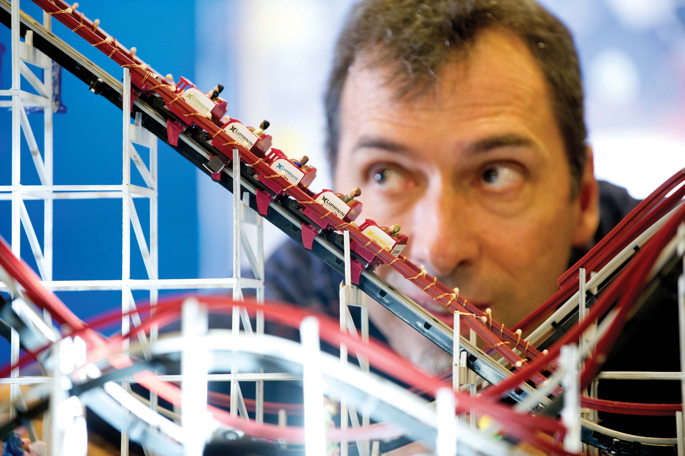 Lumenera Dany Longval with the minature rollercoaster display Dany Longval of Lumenera