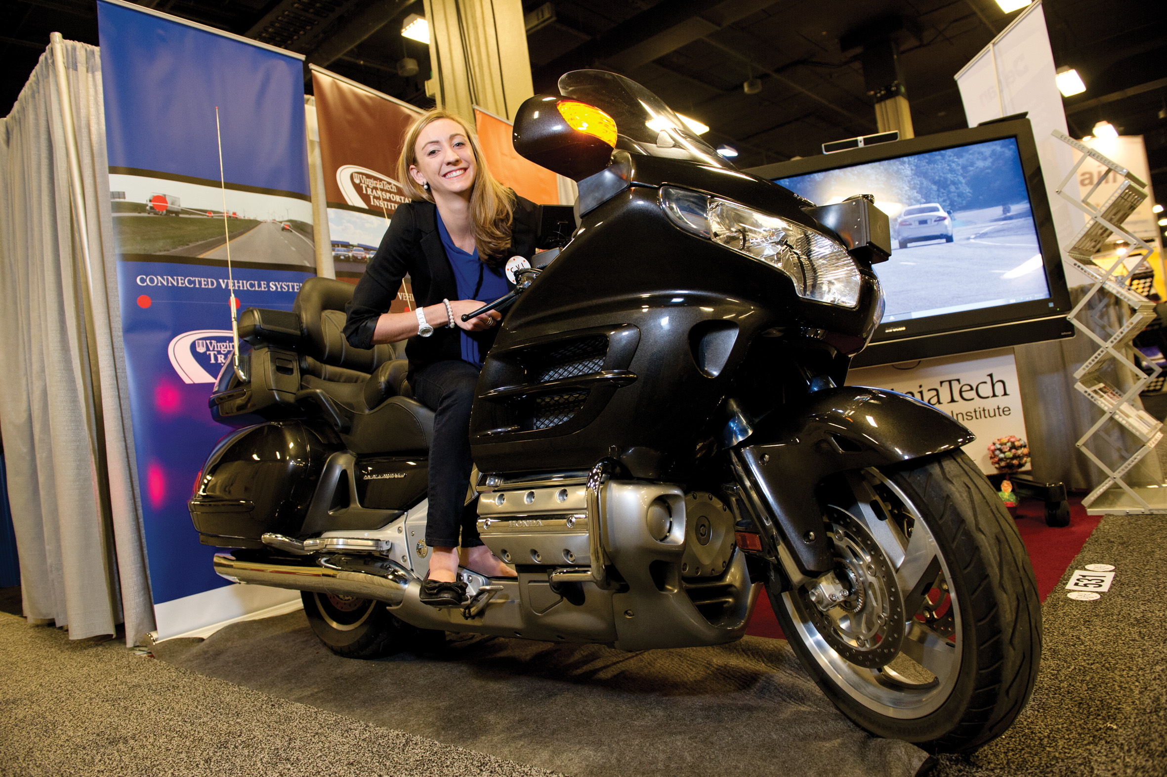 Cecilia Elpi of Virginia Tech Transportation Institute with the Honda Goldwing motorcycle Cecilia Elpi and a Honda Goldwing motorcycle