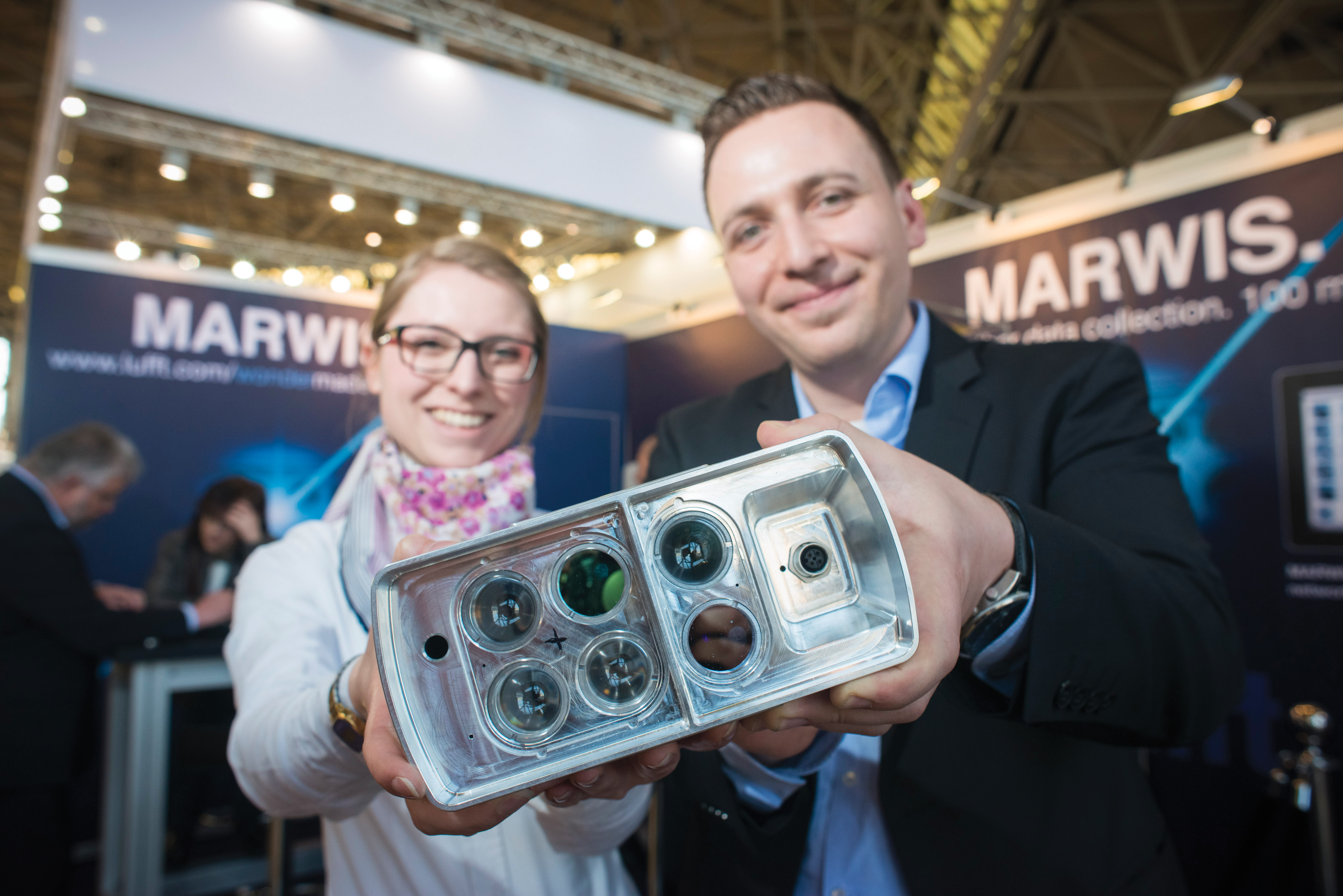 Helena Wingert and Tobias Weil of Lufft with the Marwis sensor Helena Wingert Tobias Weil Marwis sensor Lufft