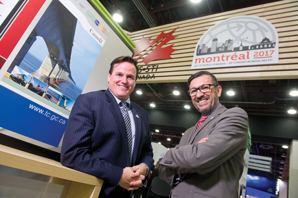 Micheal De Santis, chairman of ITS Canada, welcoming to the ITS Canada booth Claude Carette Micheal De Santis and Claude Carette