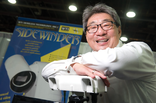 Lester Miyasaki of Wireless Technology with the pedestrian sensor Lester Miyasaki of Wireless Technology