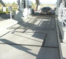 car entering toll booth