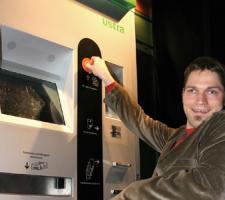 Wheelchair user using a ticket machine