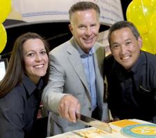 Cutting the cake: McCain’s Trisha Reddan, Jeffrey L McCain and Nathan Welch