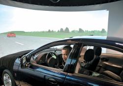 President Obama tries a V2I driving simulator