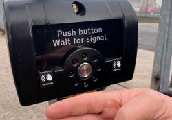 SRL says pedestrians are alerted to the contactless option by a sign on the stainless steel touch button (Credit – SRL)