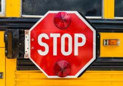 Automated enforcement will help reduce dangerous driving practices such as passing stopped school buses © Eduardo Frederiksen | Dreamstime.com