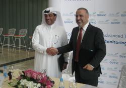 Dr. Adnan Abu-Dayya, executive director, QUWIC, and Ahmed Al Mansoori, executive director, Mowasalat, at the MoU signing ceremony