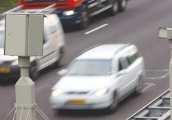 Grey speed cameras, on road 