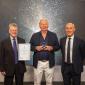 Brian Negus, ITS Australia ambassador and chairman, CICA Group (left) and Dean Zabrieszach, president, ITS Australia (right) present Dr Peter Sweatman (centre) with the 2020 Max Lay Lifetime Achievement Award (Credit: ITS Australia)