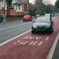 car driving in a bus lane